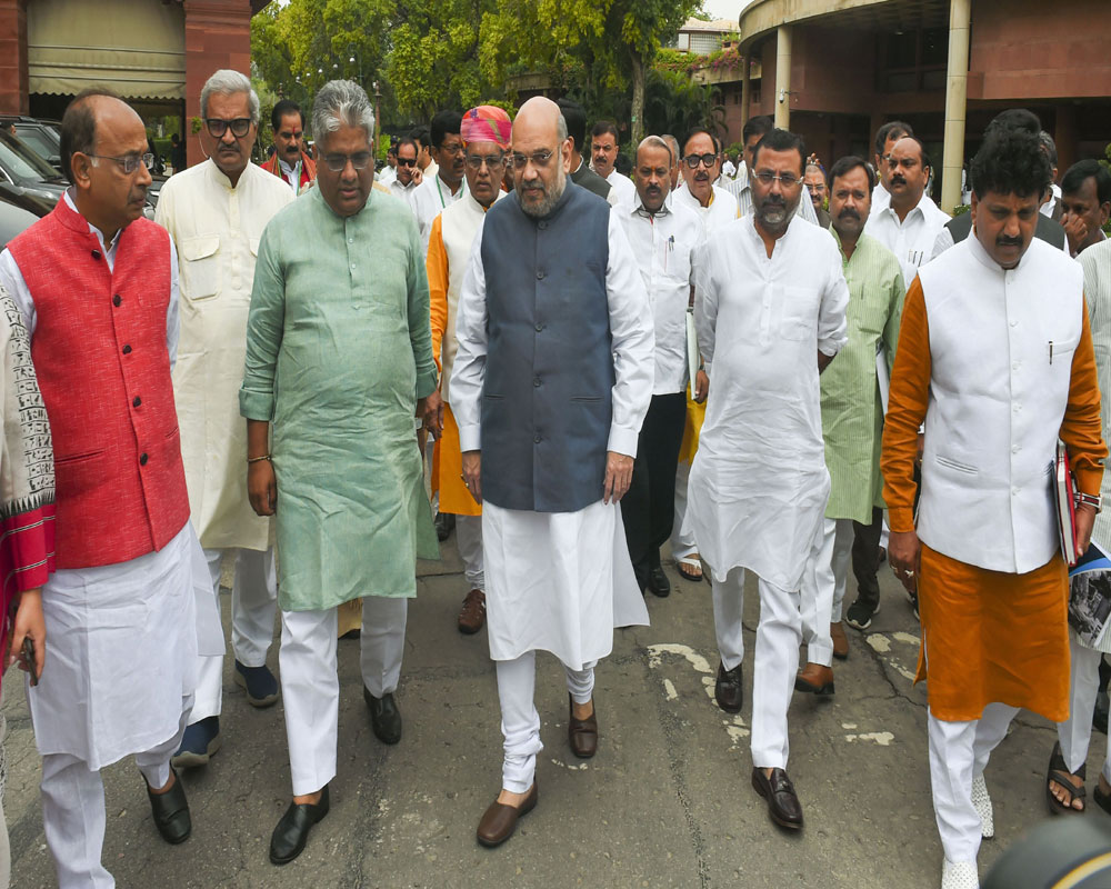 Home Minister Amit Shah along with BJP MPs leave after attending BJP parliamentary party meeting at Parliament House - PTI