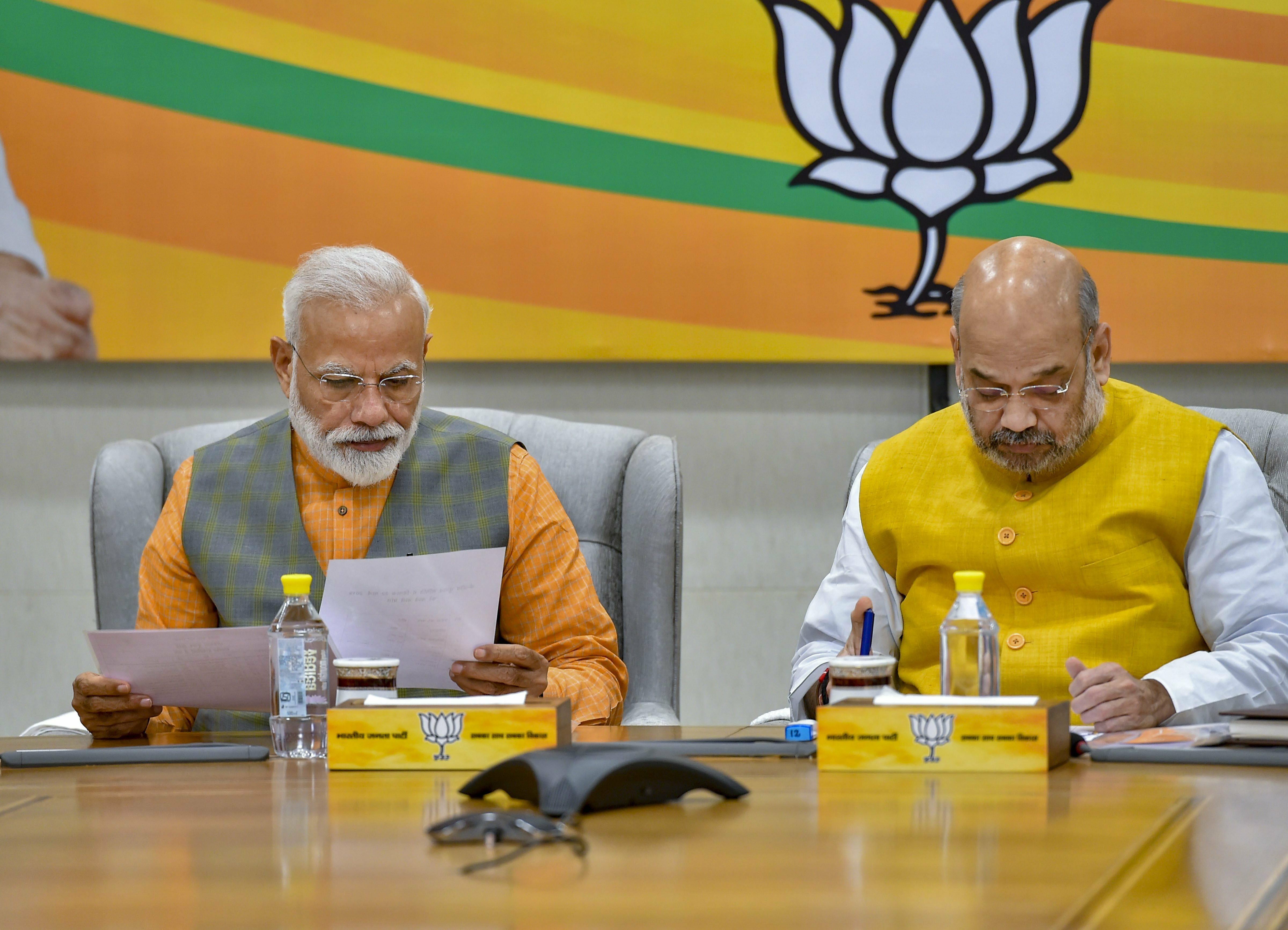 Prime Minister Narendra Modi and BJP National President Amit Shah during the BJP Central Election Committee (CEC) meeting for the upcoming Lok Sabha elections, at BJP headquarters in New Delhi - PTI