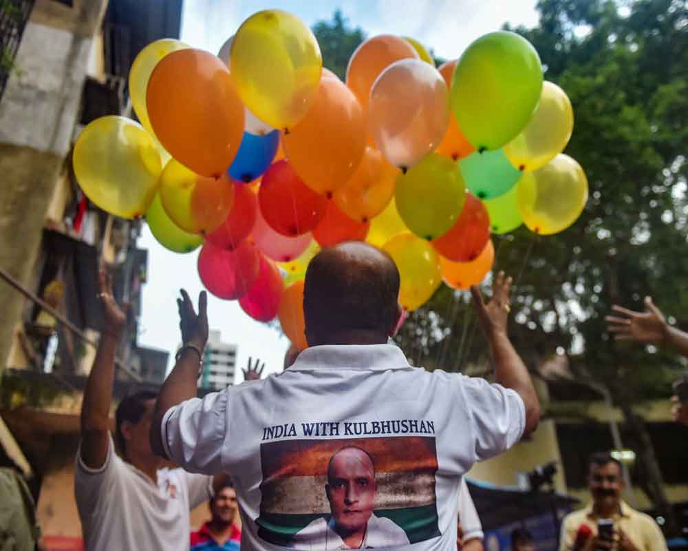 Supporters of Kulbhushan Jadhav celebrate after International Court of Justice's verdict, in Mumbai - PTI