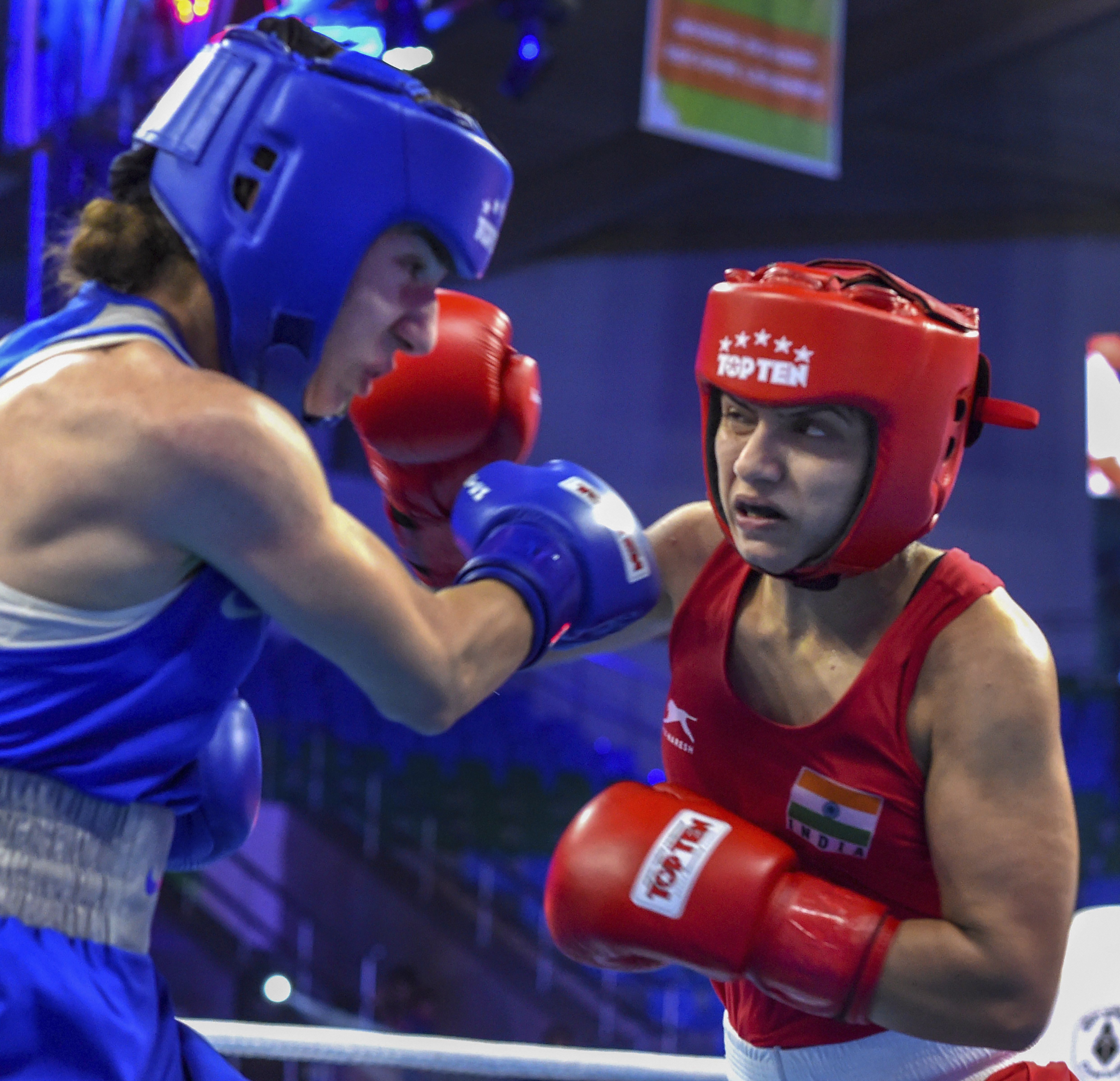 India's Pinki Rani (red) fights against Anush Grigoryan (ARM) in the women's fly 51kg category at the AIBA Women's World Boxing Championships, in New Delhi - PTI