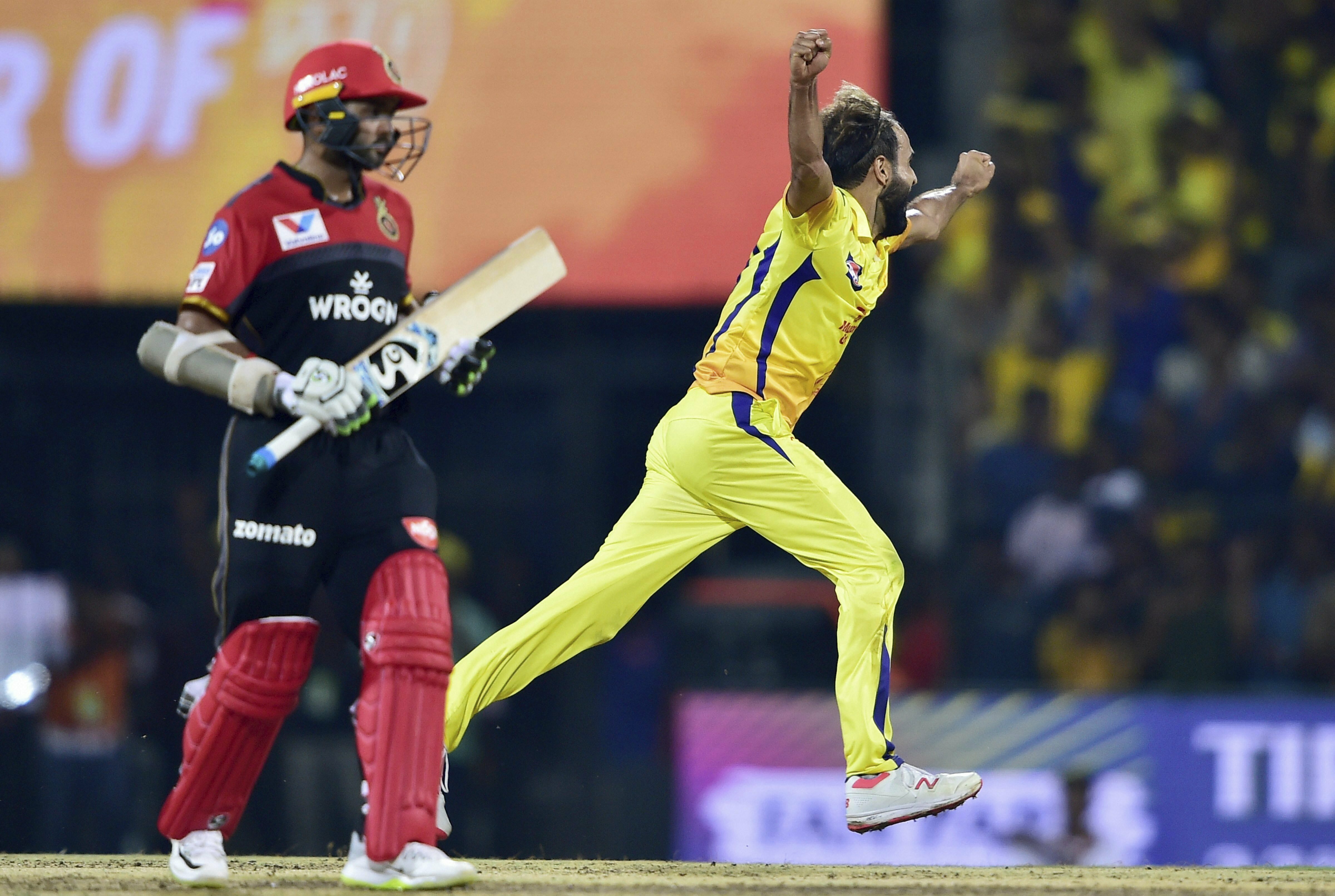 Chennai Super Kings' Imran Tahir celebrates the wicket of Royal Challengers Bangalore' Navdeep Saini during the first match of the 12th edition of the Indian Premier League 2019 T20 cricket tournament at MAC Stadium in Chennai - PTI