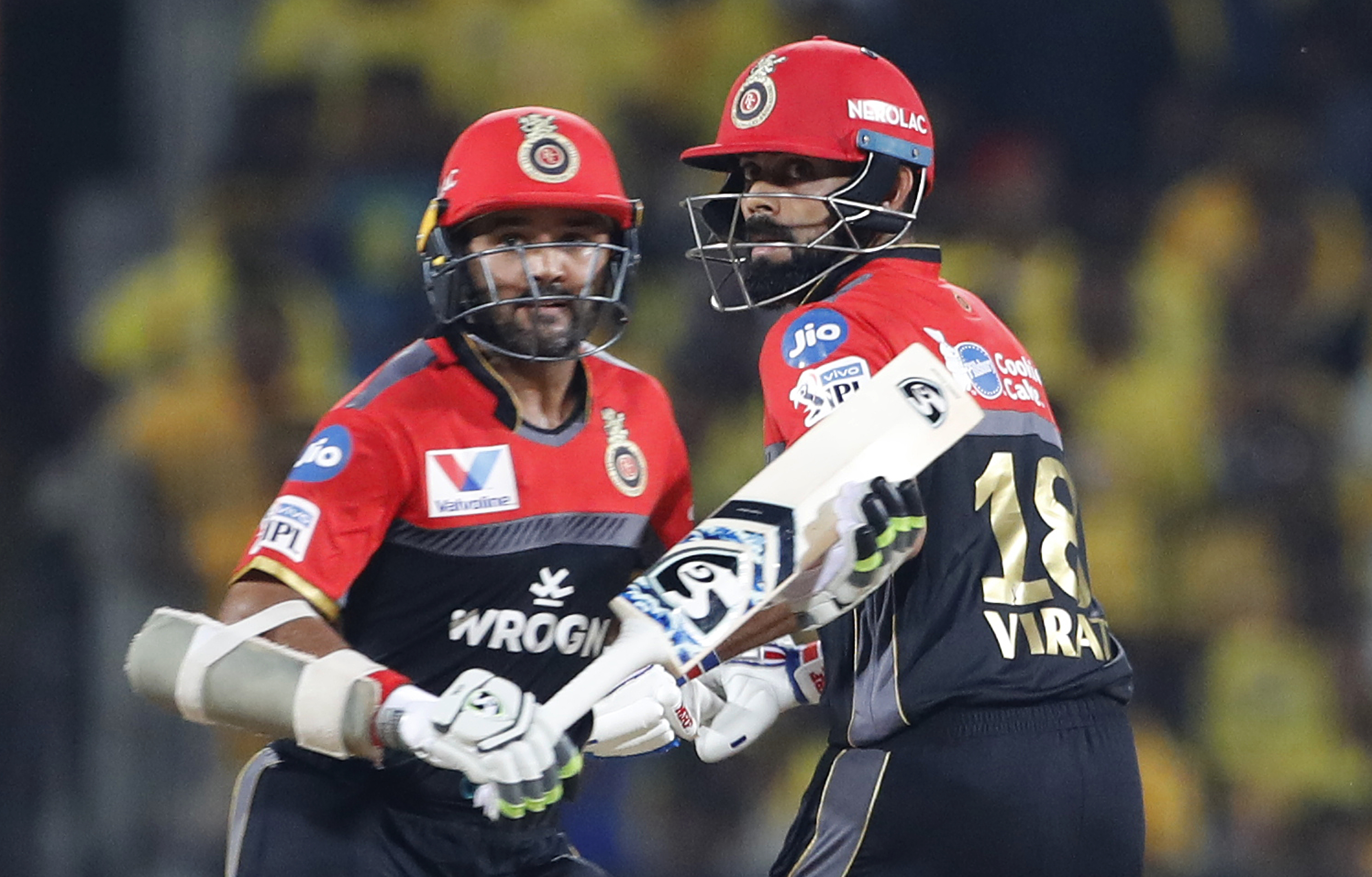 Royal Challengers Bangalore captain Virat Kohli, right, and Parthiv Patel run between the wickets to score during the VIVO IPL T20 cricket match between Chennai Super Kings and Royal Challengers Bangalore in Chennai - AP