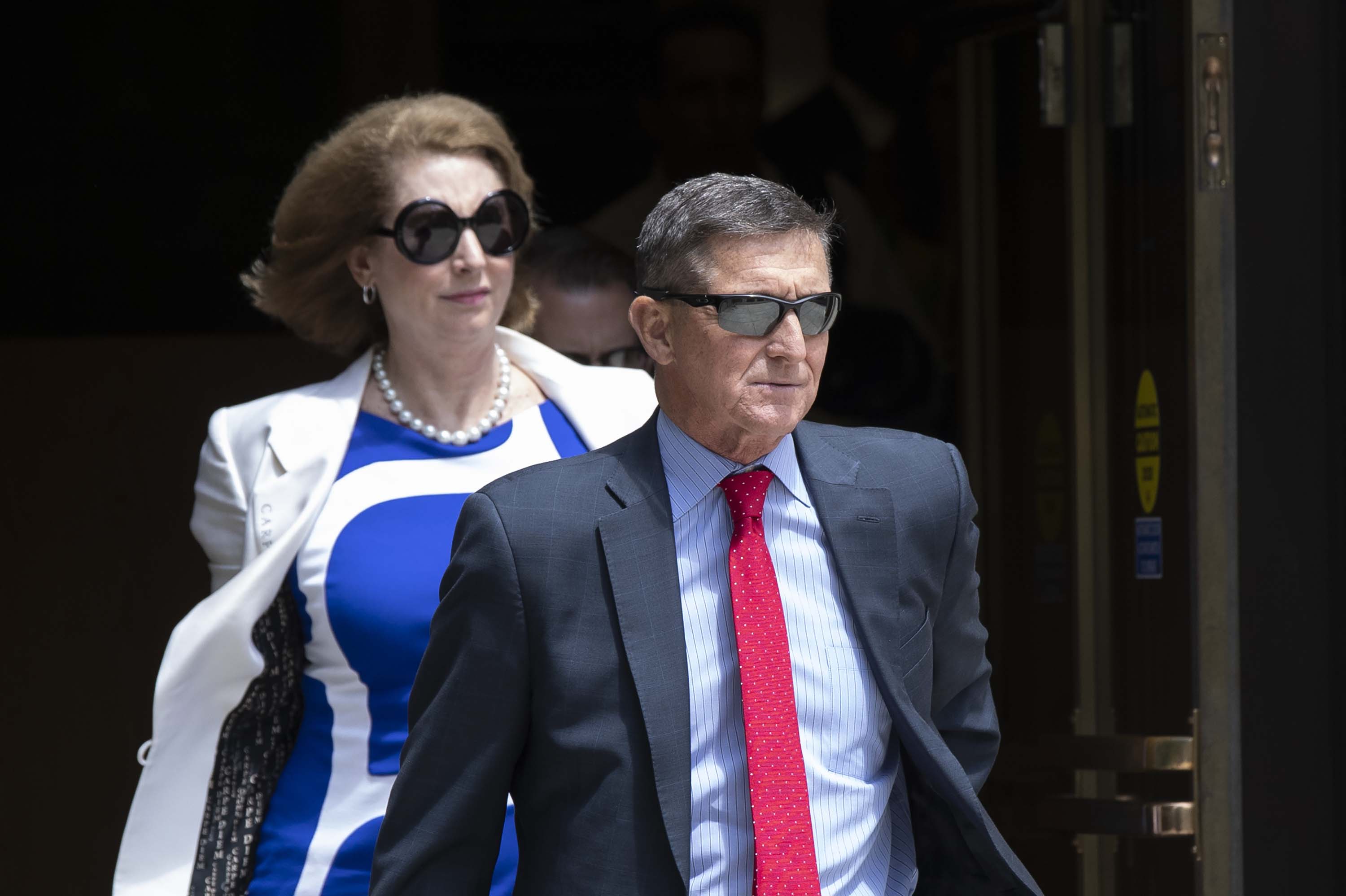 Former national security adviser Michael Flynn, leaves the federal courthouse in Washington