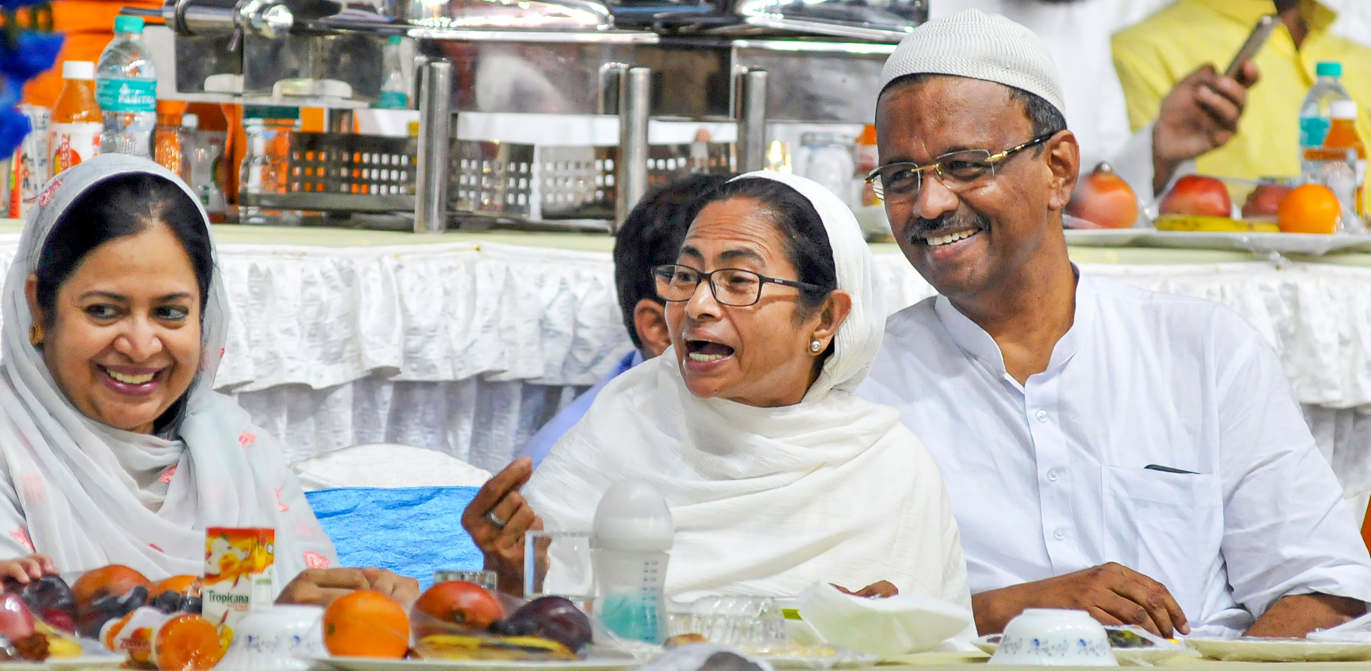 West Bengal Chief Minister Mamata Banerjee with Mayor of Kolkata Firhad Hakim (R) during an Iftar party on the eve of 'Eid-ul-Fitr', in Kolkata - PTI