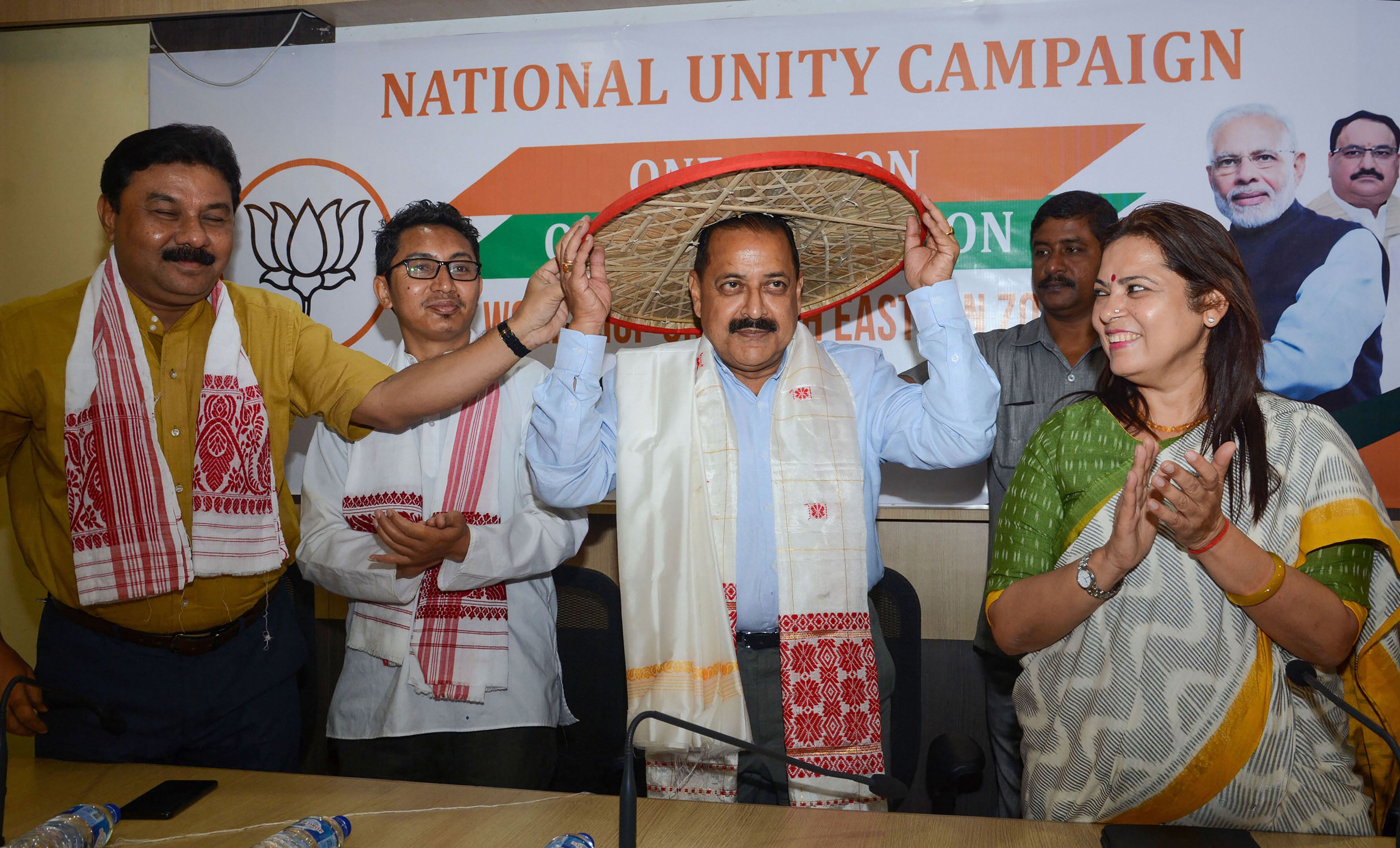 Jitendra Singh, Minister of State for Development of North Eastern Region, being felicitated with an Assamese japi - PTI