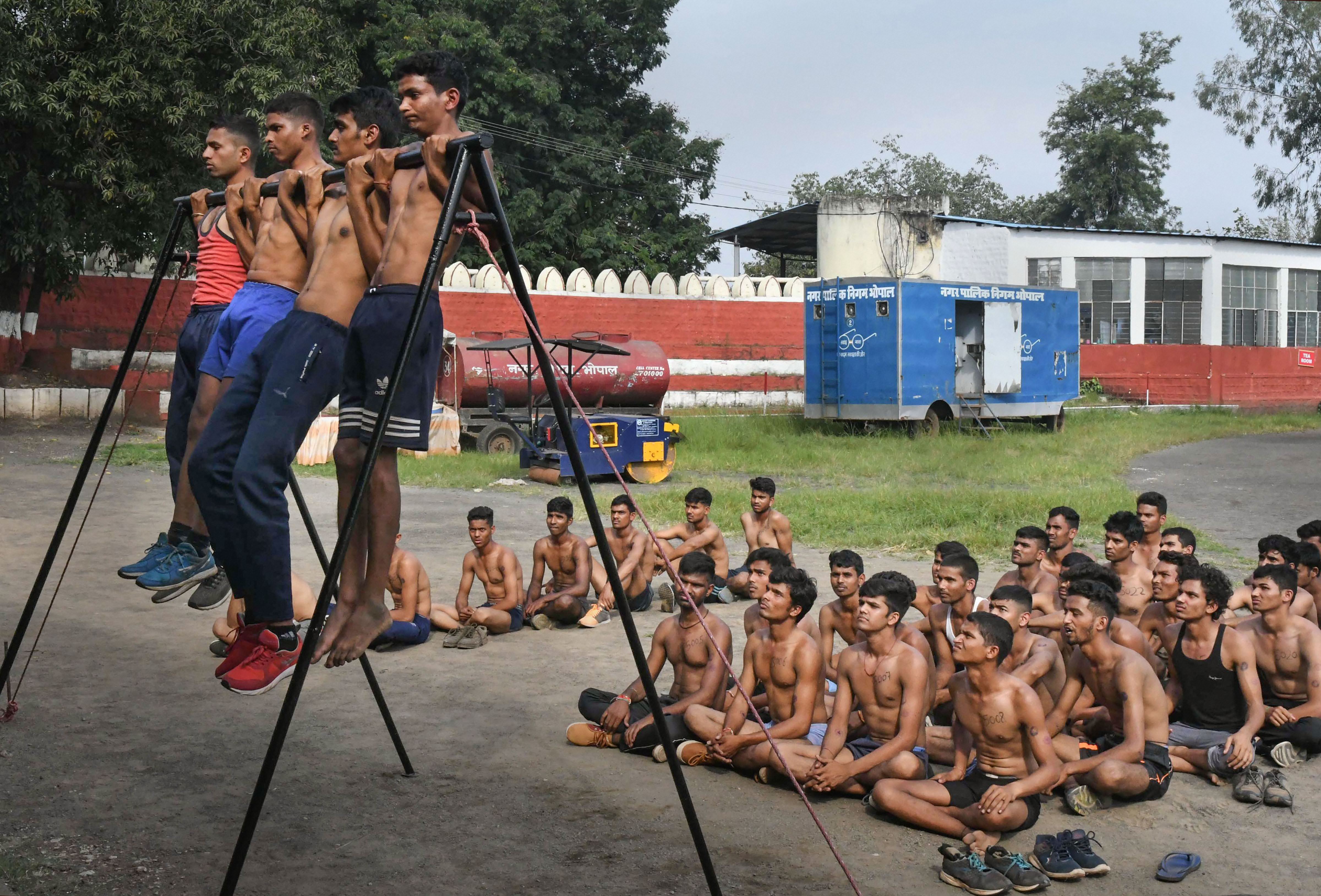 Participants undergo physical test during the Indian Army recruitment camp at Motilal Nehru Stadium, in Bhopal - PTI