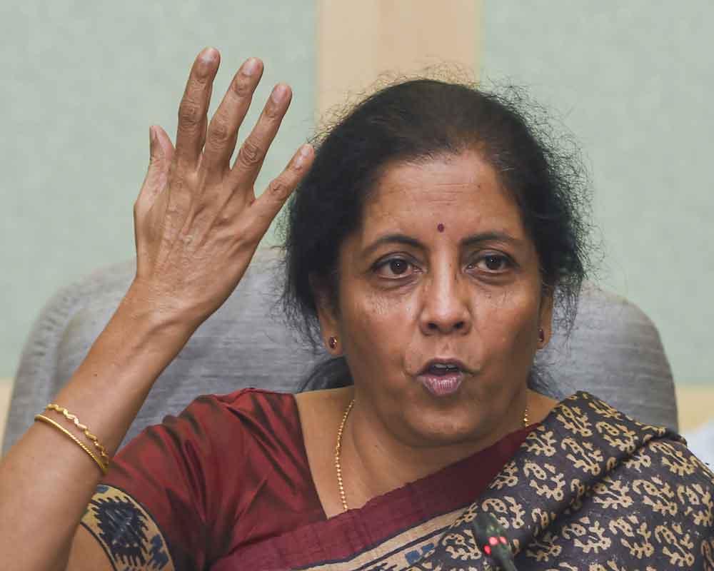 Finance Minister Nirmala Sitharaman addresses while releasing a commemorative coin on completion of 125th Birth Anniversary of Paramahansa Yogananda, at North Block, in New Delhi - PTI