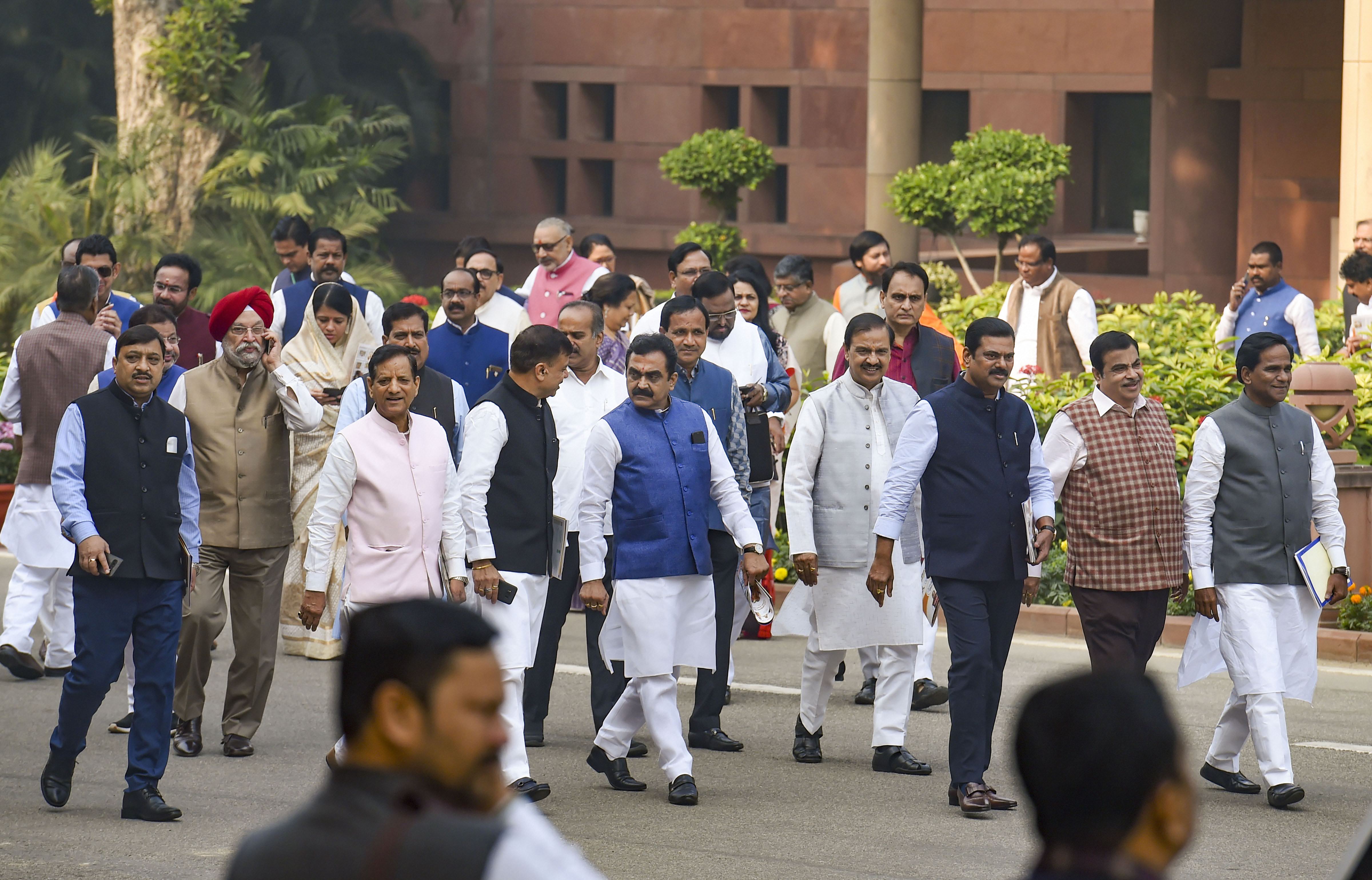 Union Minister Nitin Gadkari along with party leaders leave after the BJP parliamentary party meeting at Parliament - PTI