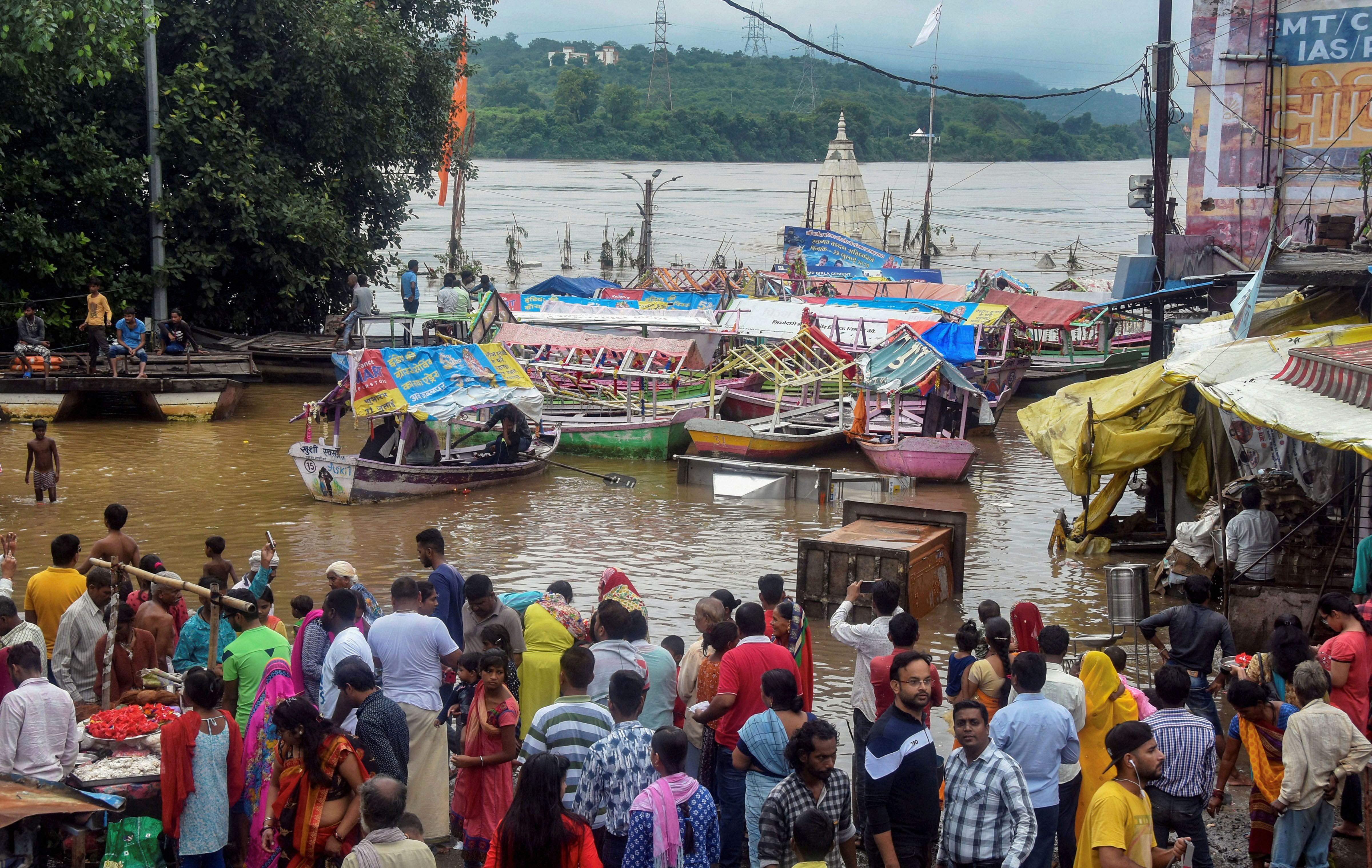 A view of the flooded Gwarighat after opening of the gates of Bargi dam, in Jabalpur - PTI