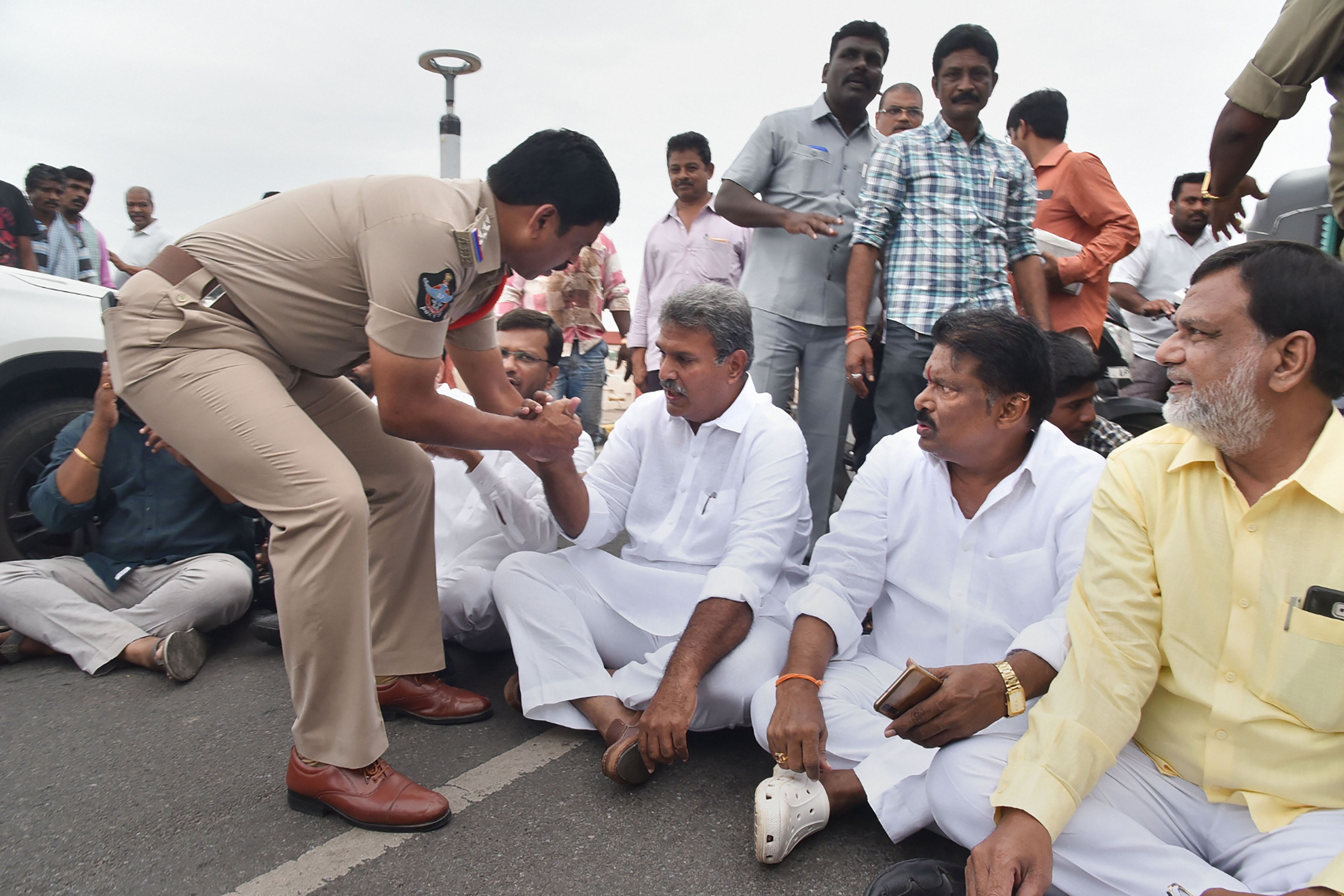 Police detain TDP MP K Srinivas and his supporters while he was on his way to party chief N Chandrababu Naidu's residence to participate in 'Chalo Atmakur' rally - PTI