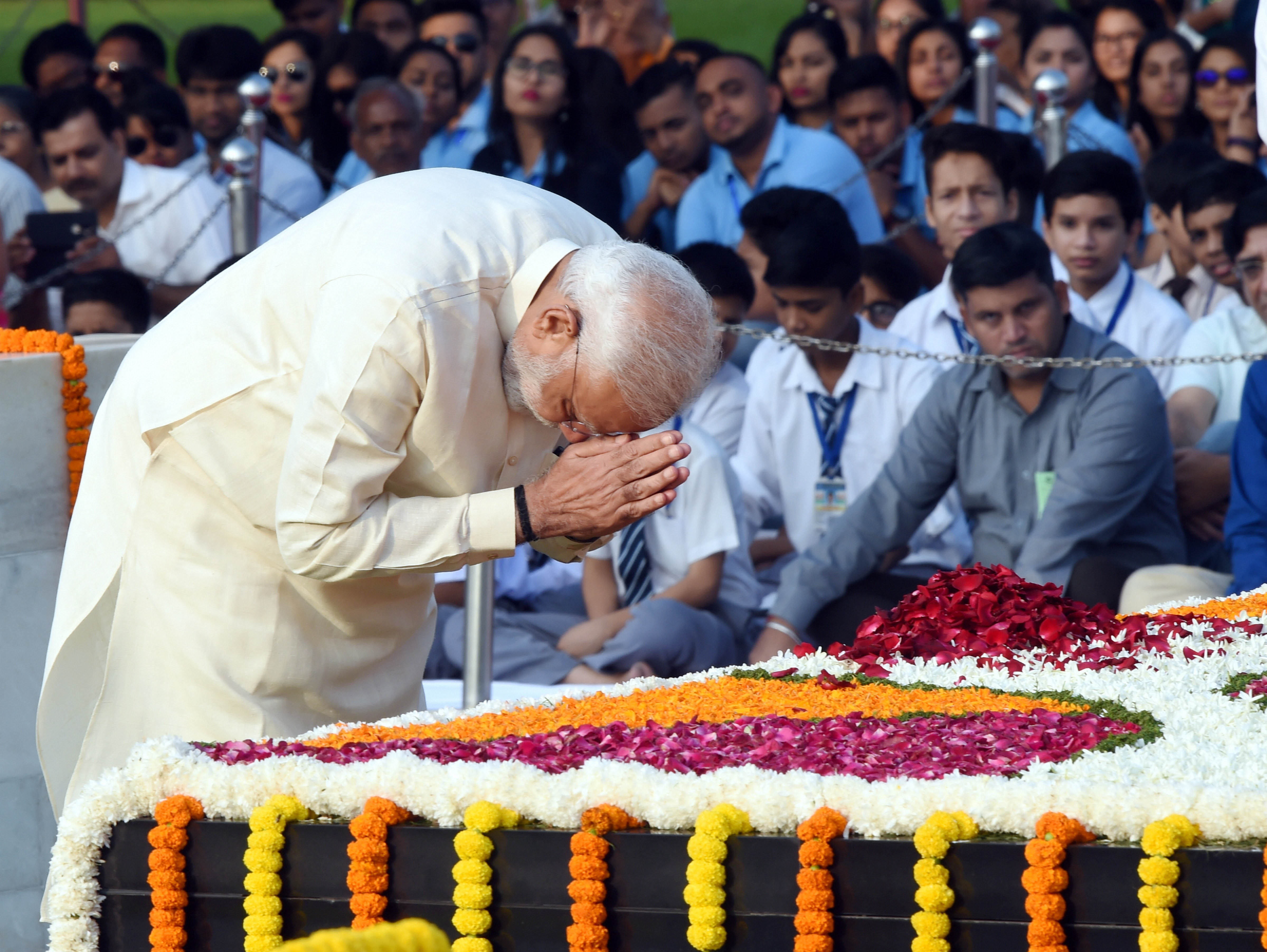 Prime Minister Narendra Modi  pays homage to Mahatma Gandhi on the occasion of his 150th birth anniversary at Rajghat - PTI