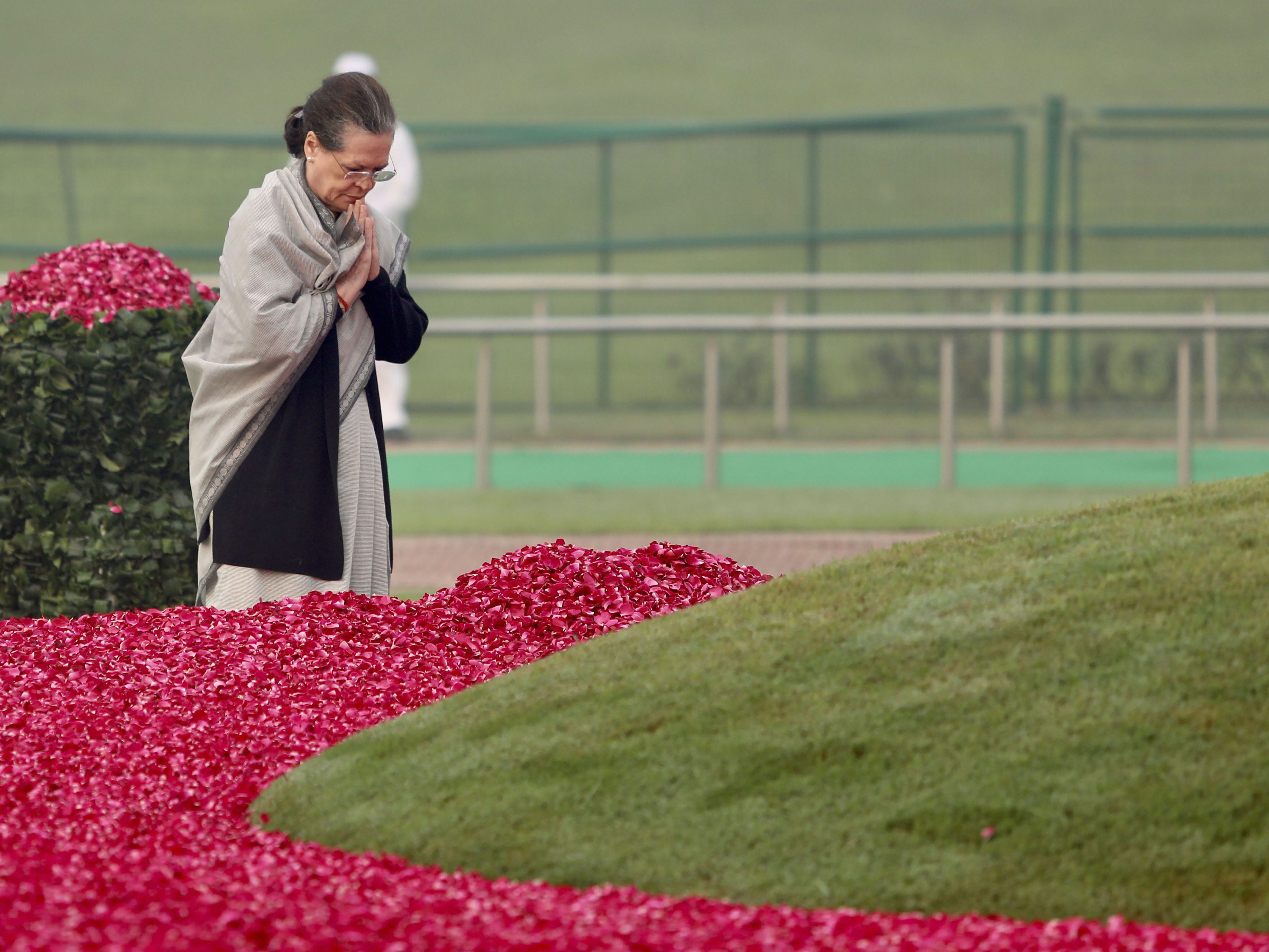 Congress President Sonia Gandhi pays floral tribute to India's first prime minister Jawaharlal Nehru on his birth anniversary at Shanti Van - PTI