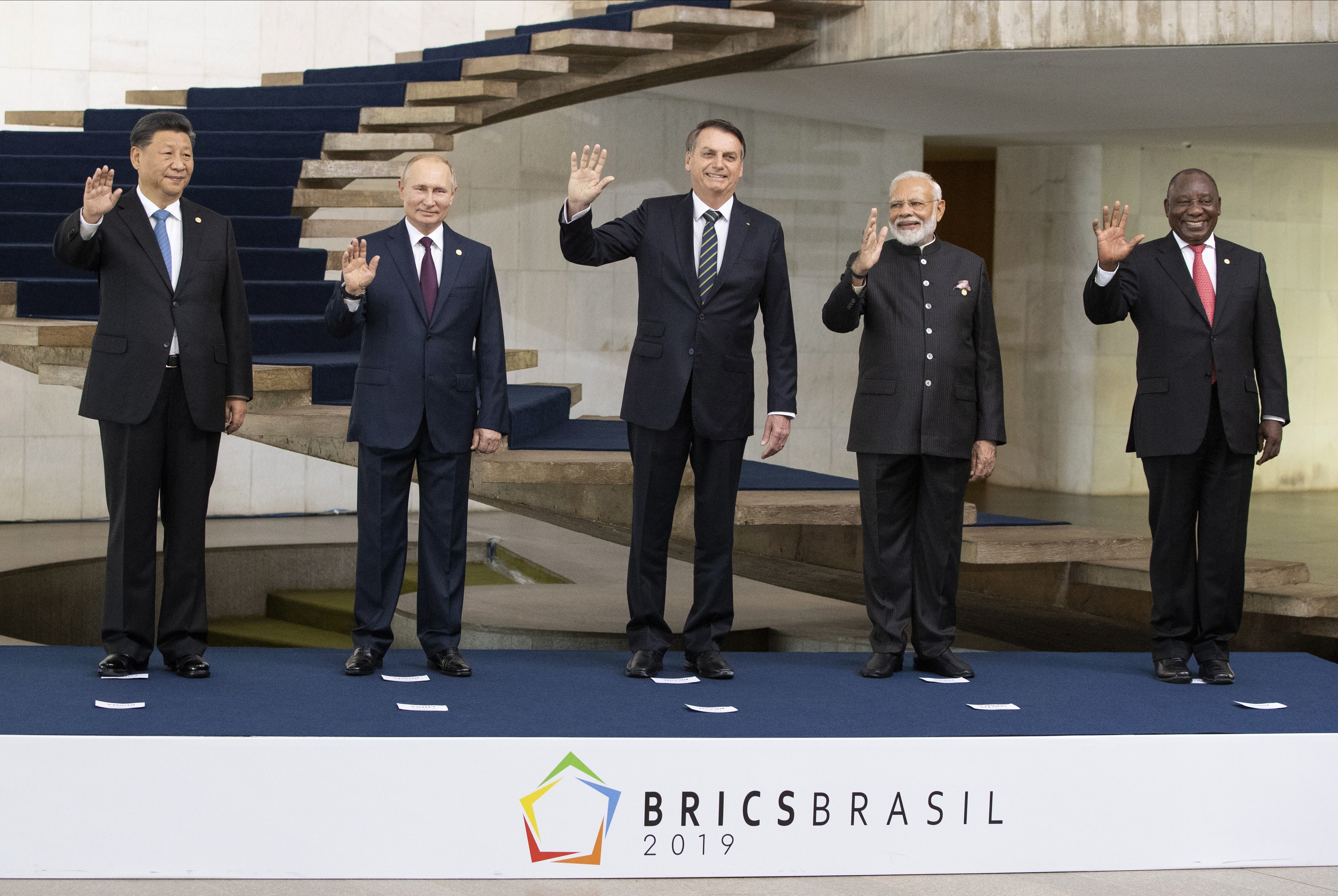China's President Xi Jinping, Russia's President Vladimir Putin, Brazil's President Jair Bolsonaro, India's Prime Minister Narendra Modi and South Africa's President Cyril Ramaphosa pose for a photo - AP