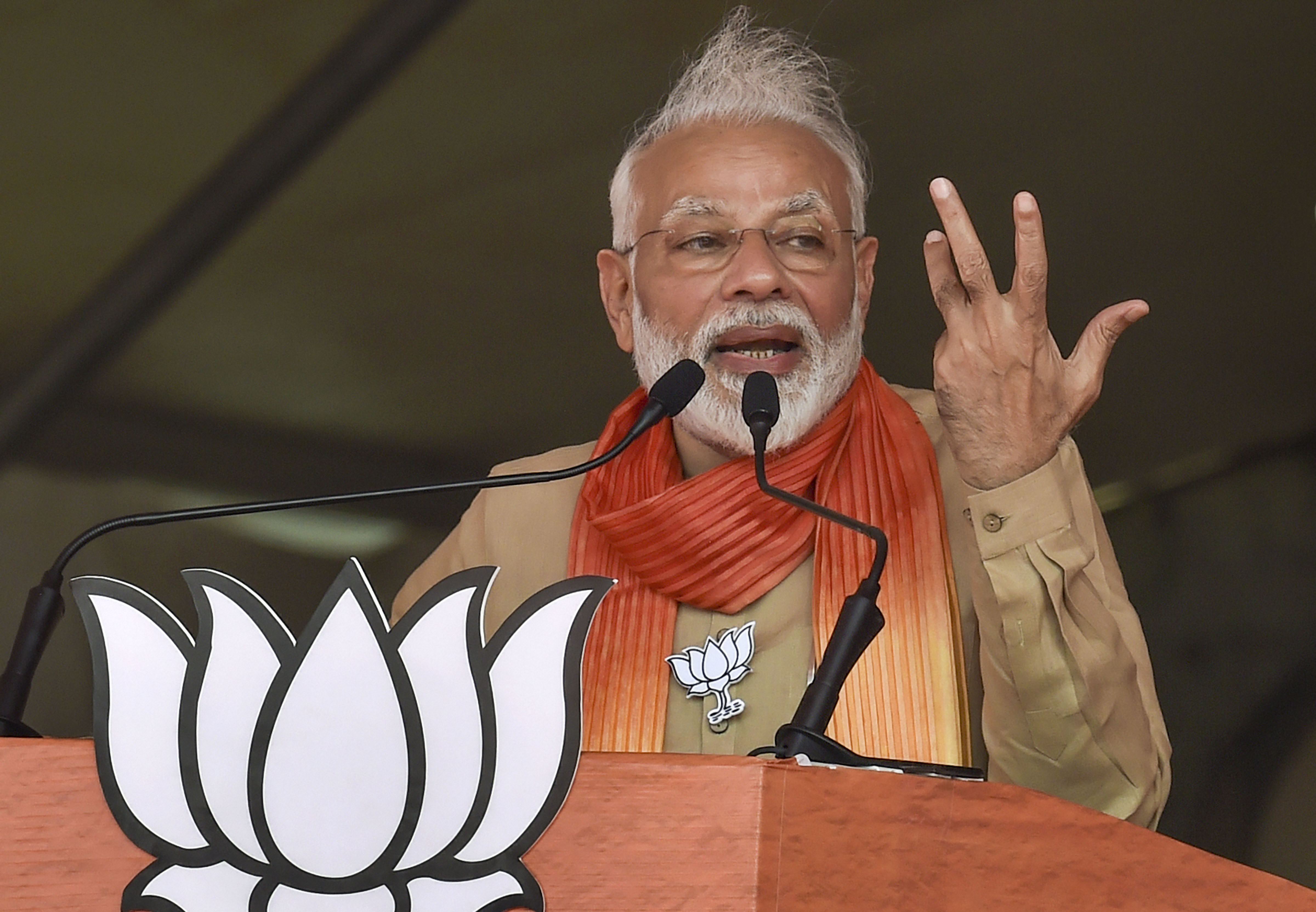 Prime Minister Narendra Modi addresses an election campaign rally ahead of Haryana Assembly elections - PTI