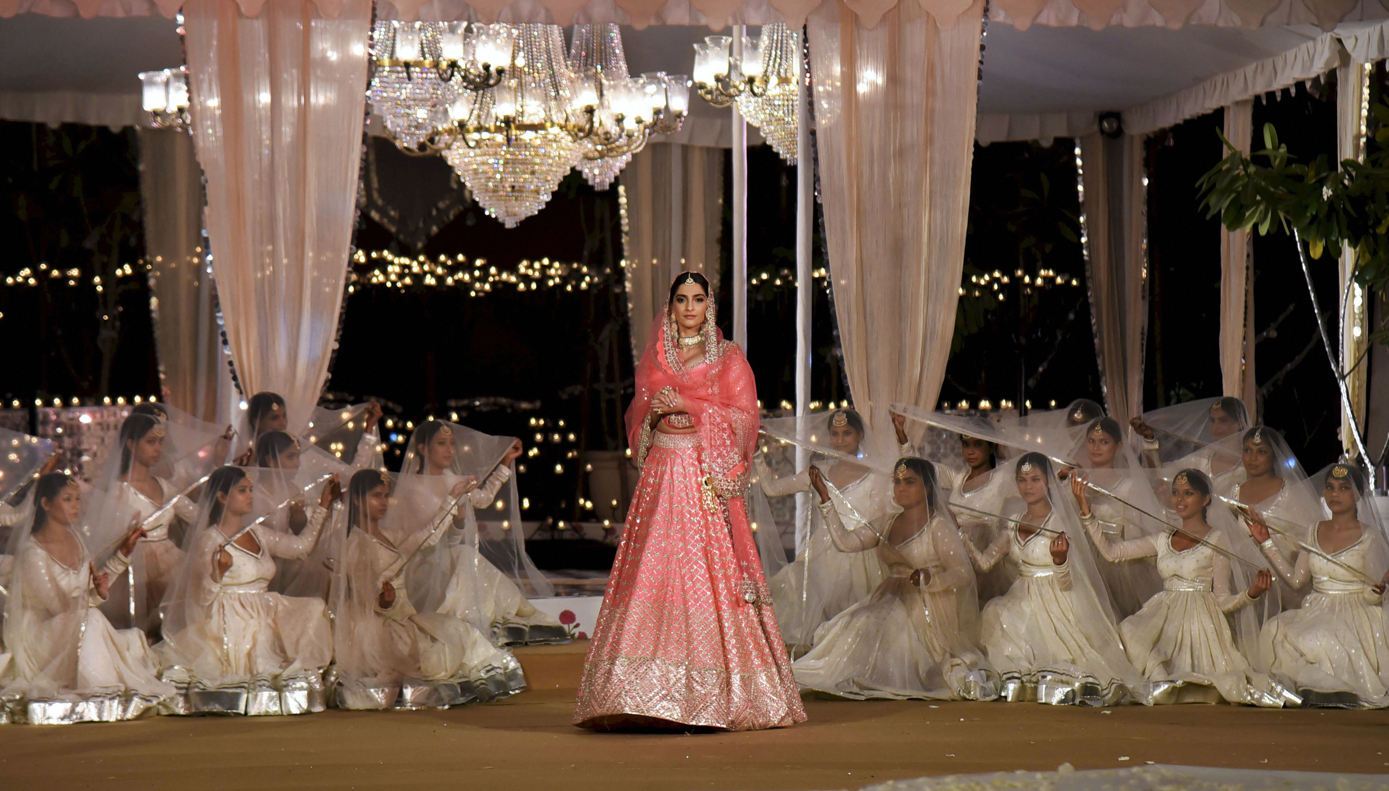 Actress Sonam Kapoor walks the ramp for designer Abhinav Mishra at a fashion event - PTI