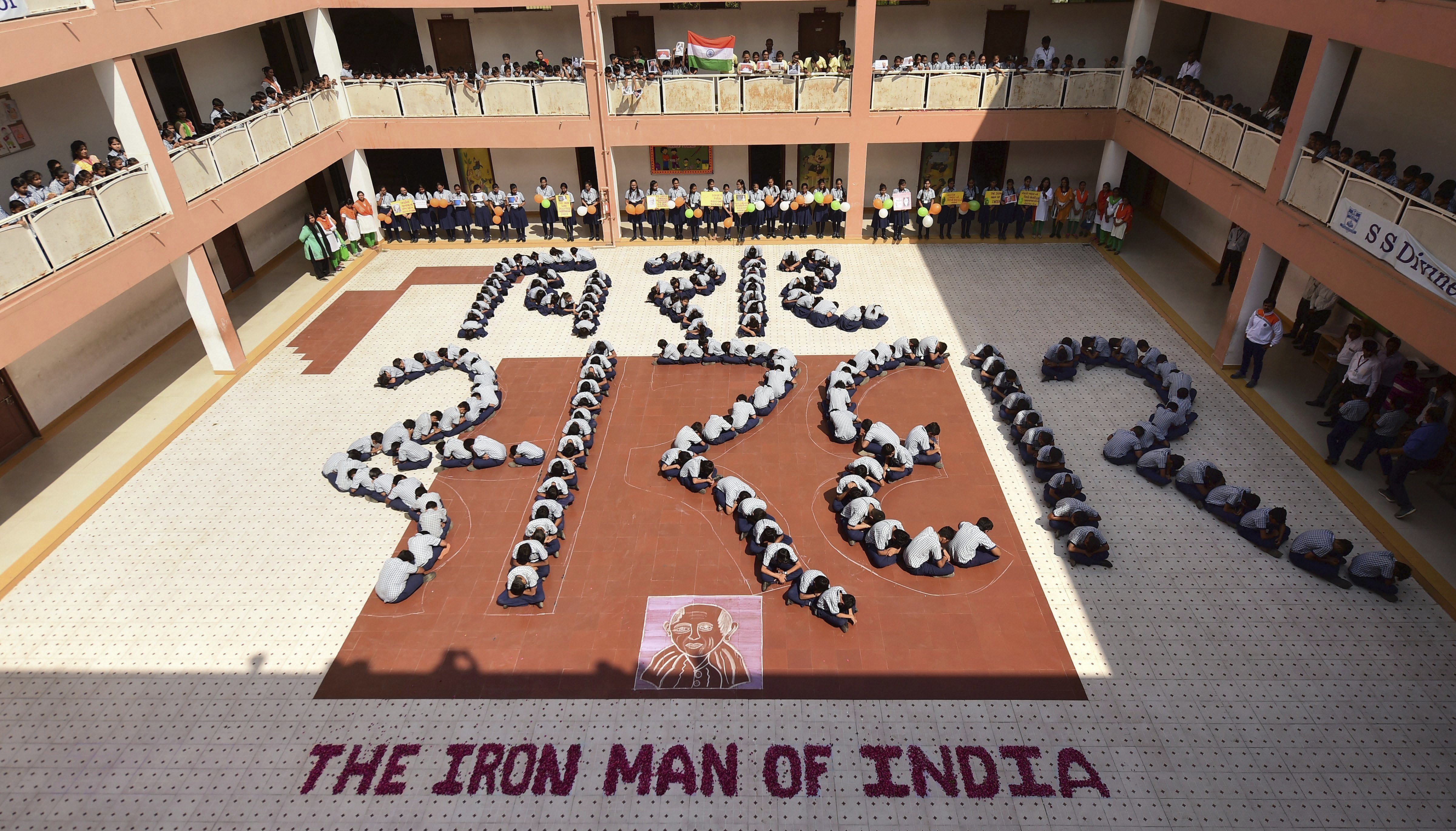 School students celebrate Sardar Patel's 143rd birth anniversary at a school in Ahmedabad - PTI